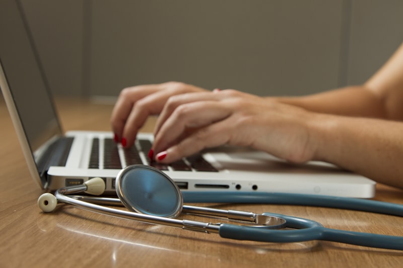 Medical researcher analyzing data on a screen